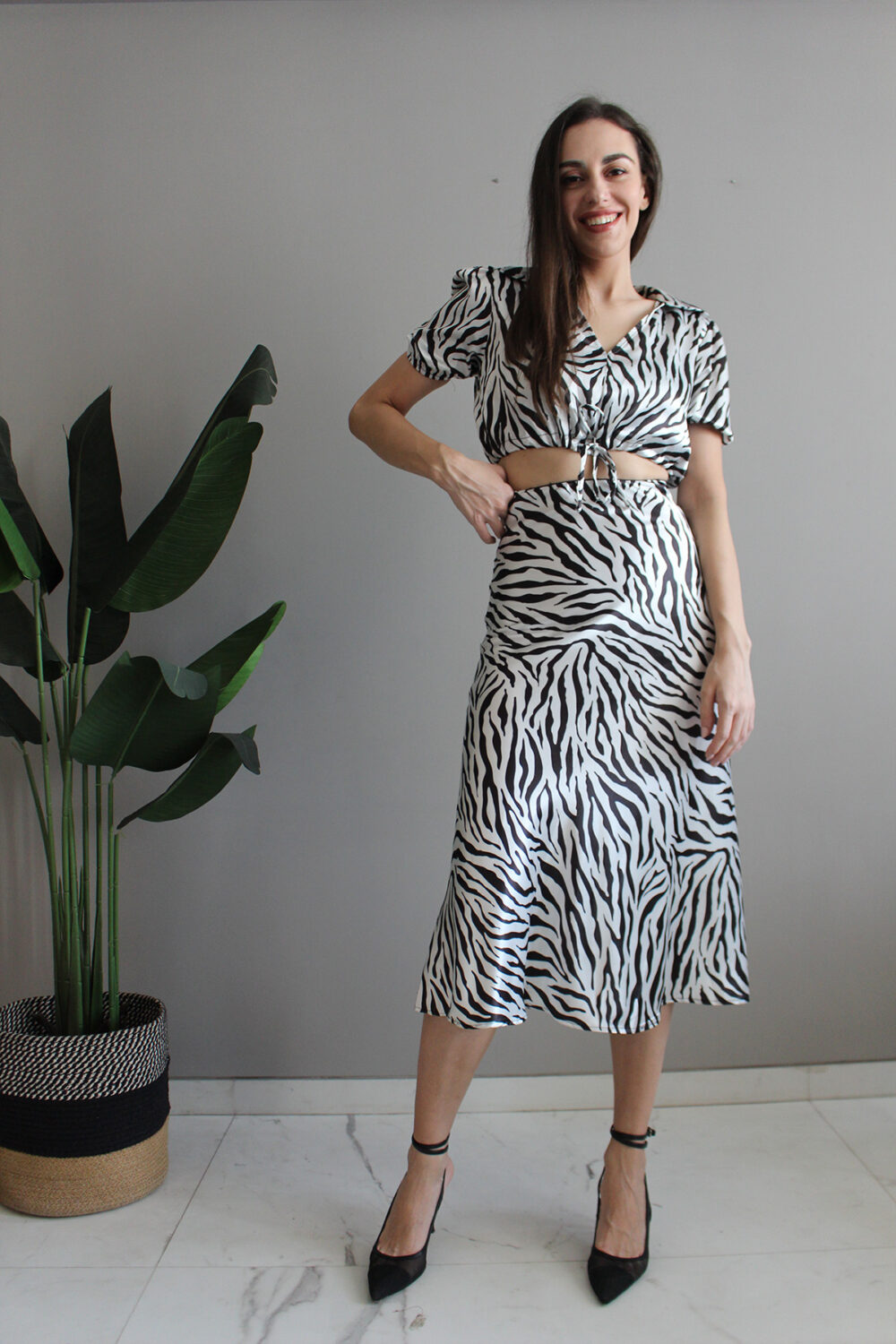Collared Zebra print crop top paired with fishtail midi skirt